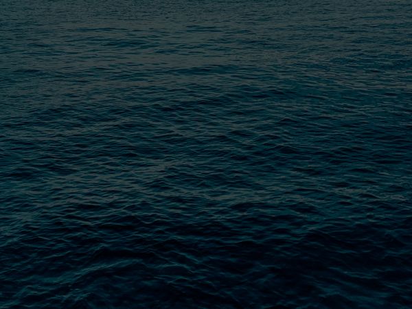 Calm Dark Blue Sea Background Free Photo