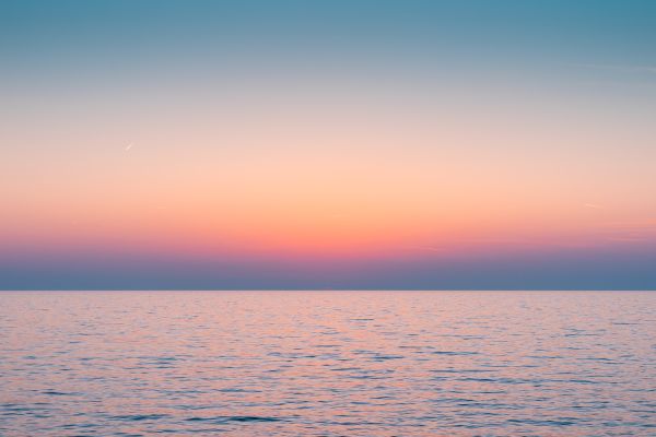 Colorful Dawn Sky Above The Calm Sea Horizon Free Photo