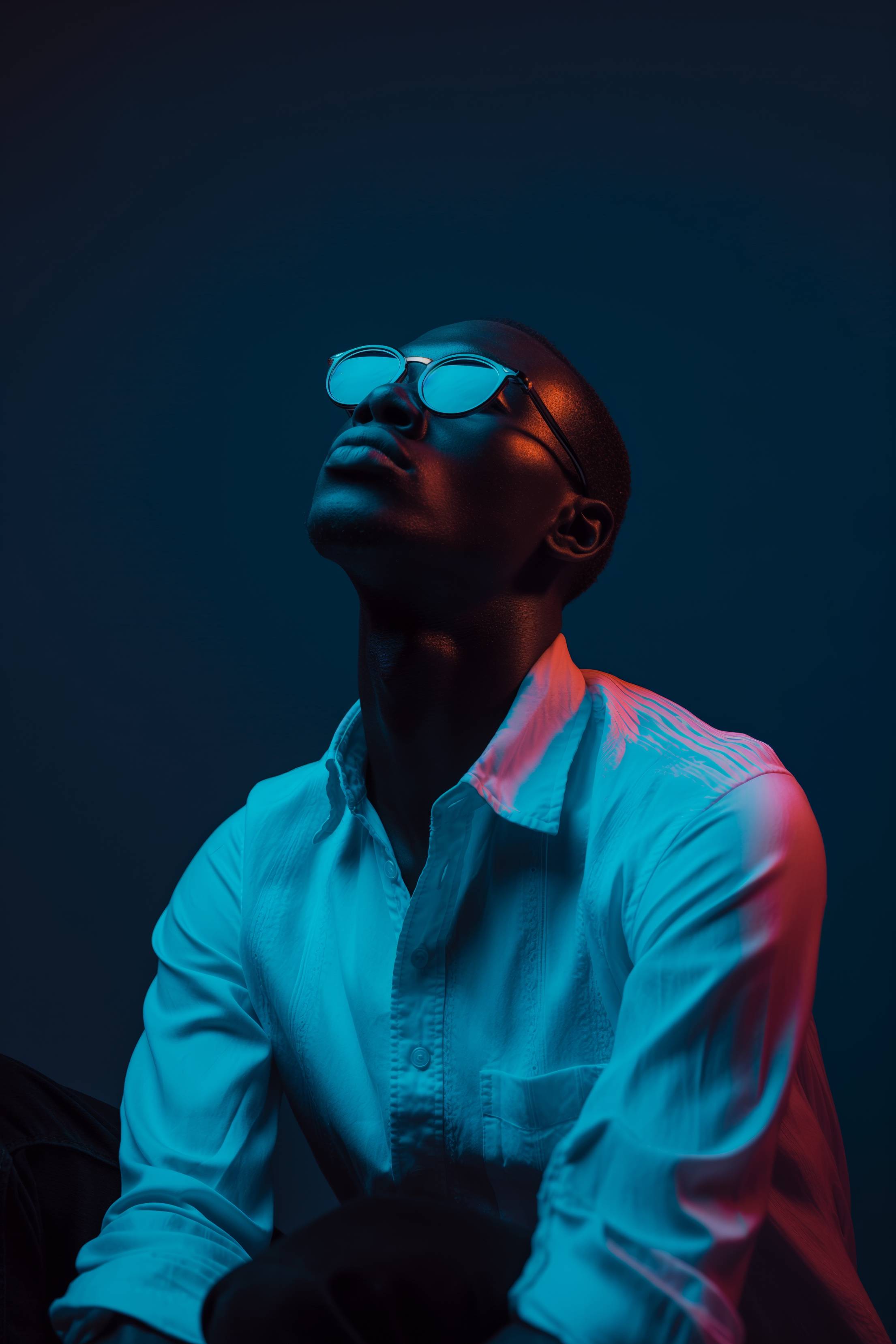 Fashion Portrait of Young Black Man With Glasses Blue Mood Free Image