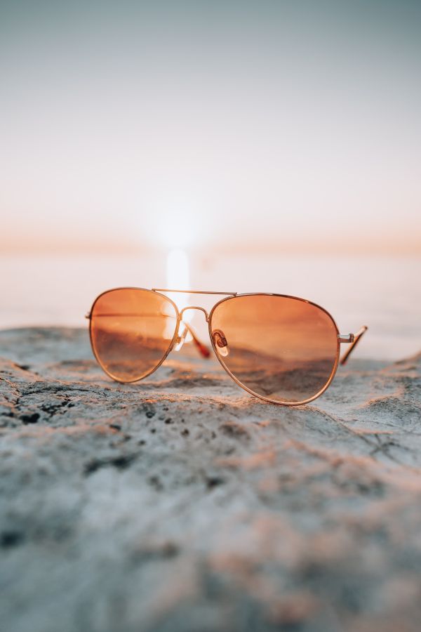 Fashion Sunglasses Sea Sunset and Stone Free Photo