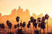 Los Angeles golden hour cityscape over downtown skyscrapers