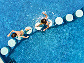 Kids Swimming in a pool