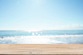 Empty Wooden Planks with Blur Beach on Background