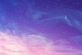 View on a evening purple sky with cirrus clouds and stars (background, abstract)