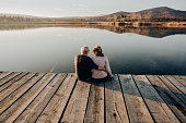 Enjoying together by the lake