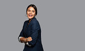 Young woman front of white background.