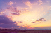 Violet purple sky in morning scenery Vibrant colorful blue sky summer time on sunrise. Natural beautiful landscape. Beauty purple sky romantic dramatic landscape cloudy outdoor paradise in sunset