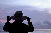 Female tourist relaxing by the sea