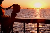 Enjoying sunset by the sea