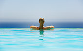 Woman in infinity pool