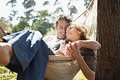 Couple sitting in hammock