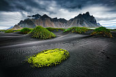 Great wind rippled beach black sand. Location famous place Stokksnes cape, Vestrahorn (Batman Mountain), Iceland, Europe.