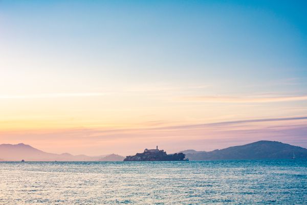 Lonely Alcatraz Island in The Middle of San Francisco Bay Free Photo