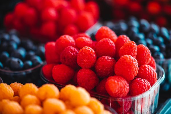 Raspberries and Blueberries on The Farmers Market Free Photo