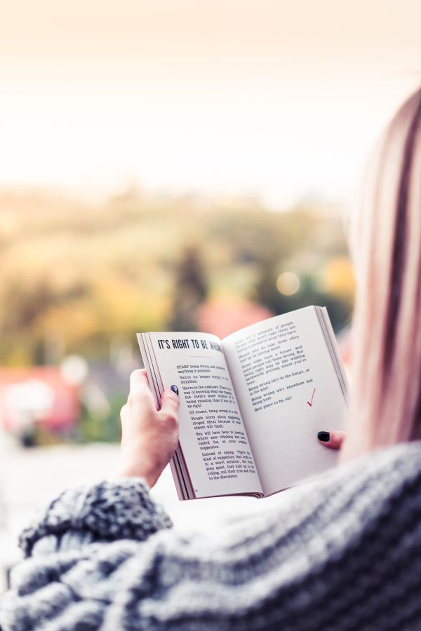 Reading a Book Free Photo