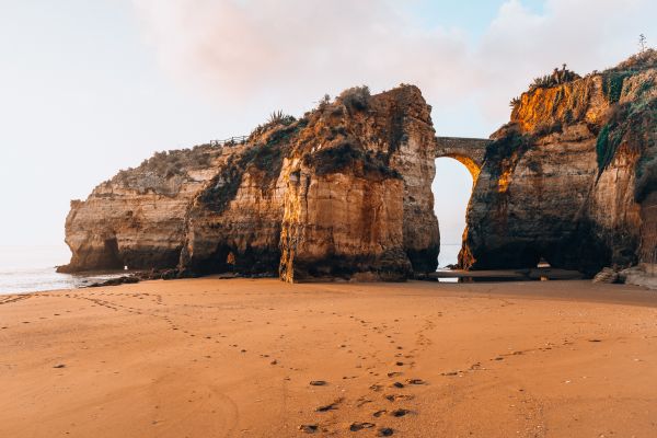 Stoney Bridge Between Cliffs in Portugal Free Photo