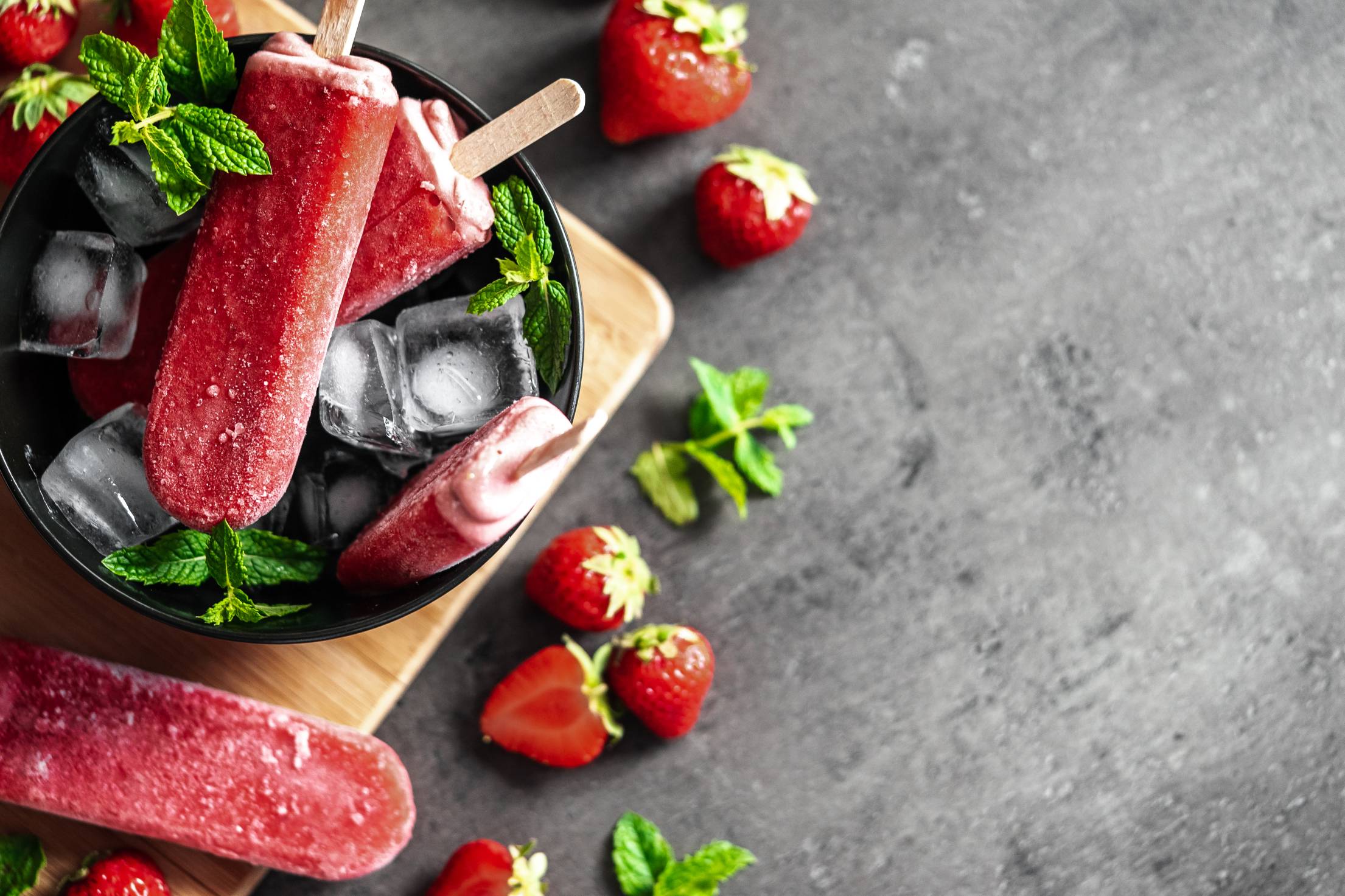 Strawberry Popsicles Flat Lay with a Space for Text Free Photo