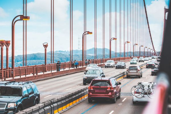 Traffic: a Lot of Cars Driving Across The Golden Gate Bridge Free Photo