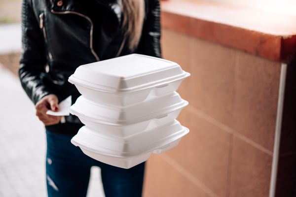 Woman Holding Boxes with Food Free Photo