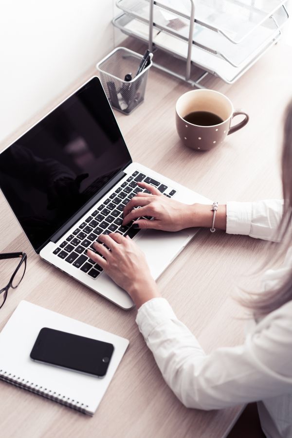 Woman Working in Modern Office Space Free Photo