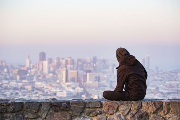 Young Man Enjoying Moment and Looking Over the San Francisco Free Photo