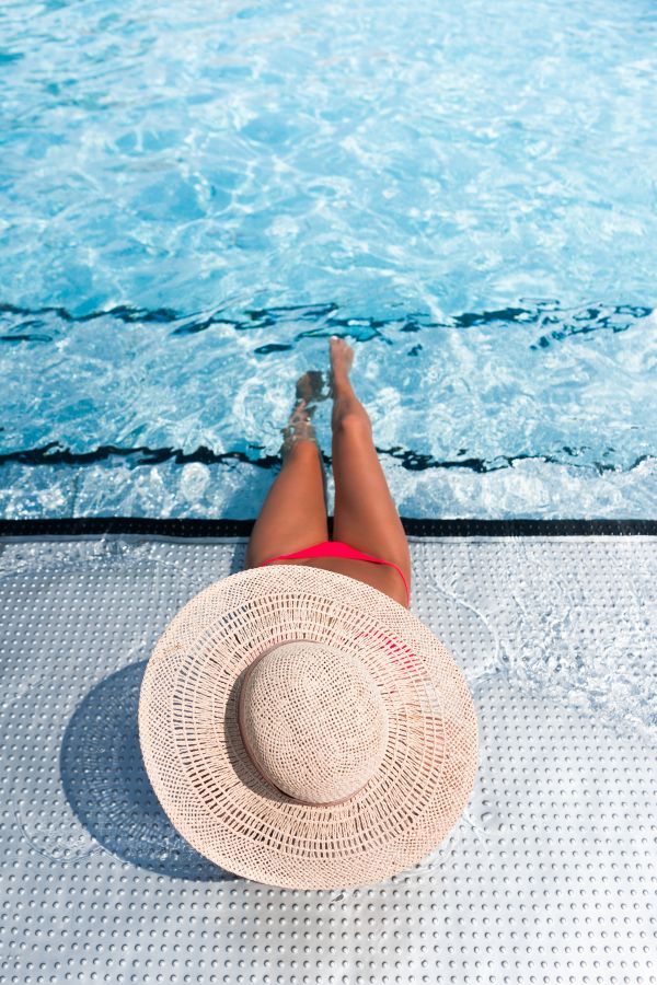 Young Sexy Woman in Swimming Pool Free Photo