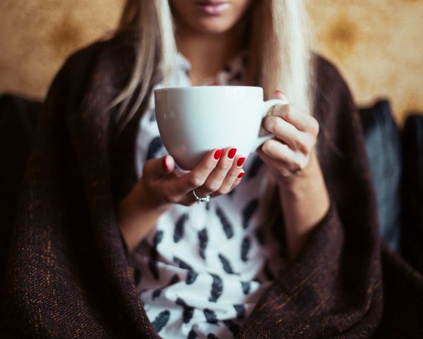 Young Woman Drinking a Tea Free Photo